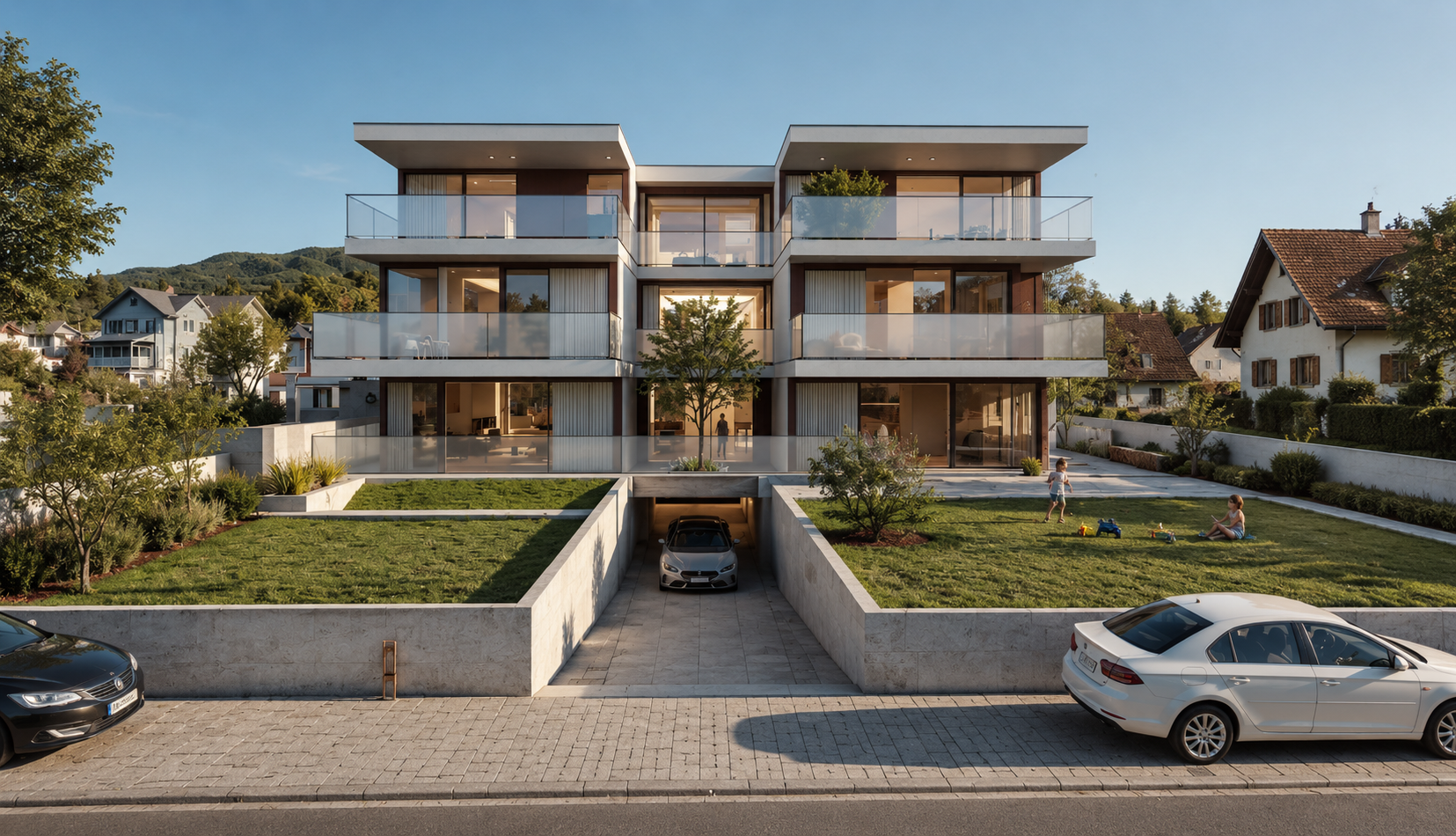 Mehrfamilienhaus mit umlaufenden Balkonen, Glasgeländern und Tiefgarageneinfahrt